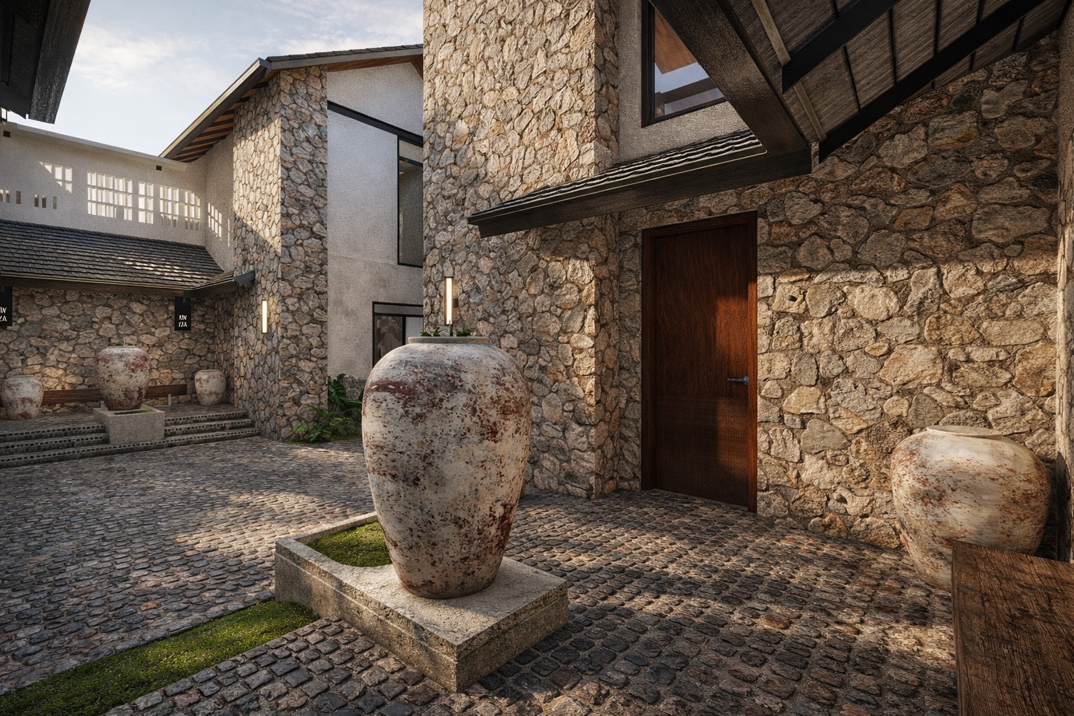Stone entrance courtyard with handcrafted clay urns